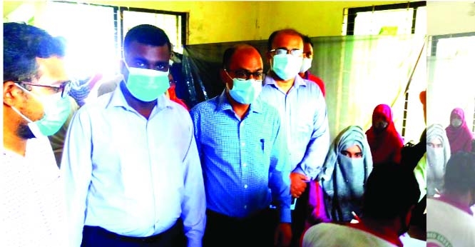 Barguna Deputy Commissioner Habibur Rahman visits a Union level vaccine booth under Betagi upazila after inaugurating Mass inoculation campaign on Saturday.