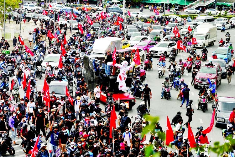 Demonstrators gather during a protest against what they call the government's failure in handling the coronavirus pandemic in Bangkok, Thailand on Saturday.