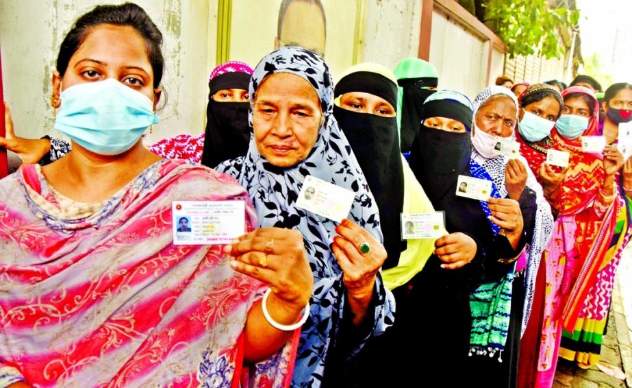 Elderly women show up National Identity Cards (NIDs) to get their Covid-19 vaccine shot at a center in Dhaka South City Corporation on Saturday, the first day of an extended mass immunisation campaign in Bangladesh.