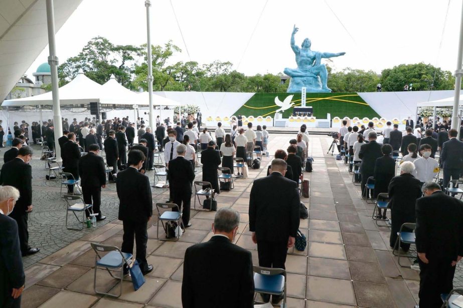 Attendees offered a silent prayer for the victims of the US atomic bombing at the time when the bomb was dropped, during a ceremony at Nagasaki Peace Park in Nagasaki, southern Japan on Monday.