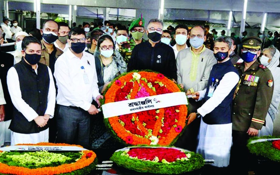 PM's Prinicipal Secretary Dr. Ahmad Kaikaus, among others, pays floral tributes at the portrait of Bangabandhu Sheikh Mujibur Rahman at 32, Dhanmondi on Sunday. PMO photo