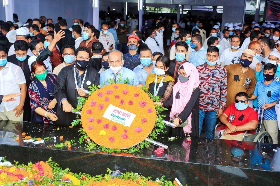 Md. Anowar Habib Kazal, Senior Assistant Director, Public Relations DIU along with a large number of students, faculty members and officials pay homage placing floral wreaths at portrait of Father of the Nation Bangabandhu Sheikh Mujibur Rahman in front o