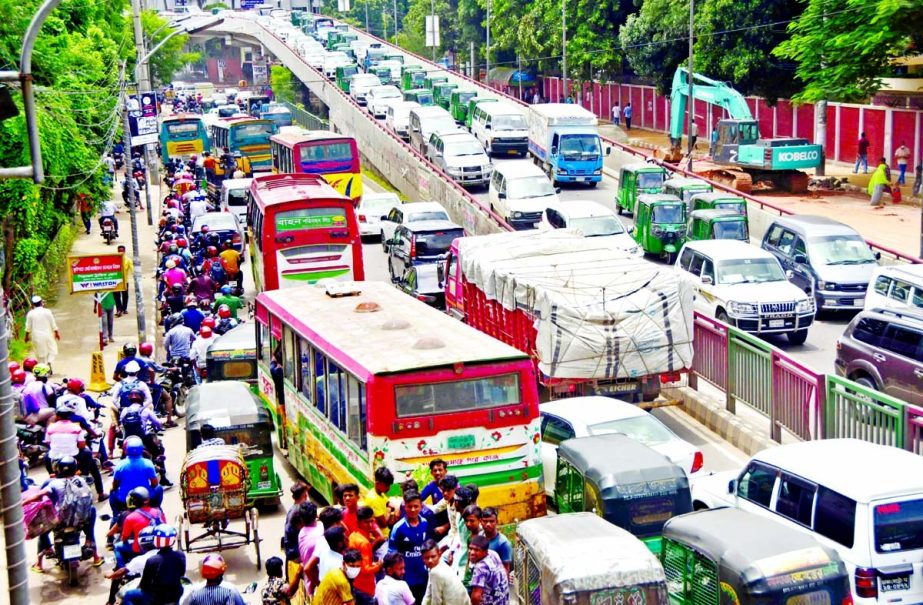 A congestion of vehicles is seen on Tejgaon road in the capital amid increased traffic on Tuesday
