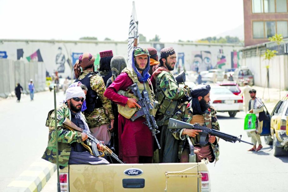 Taliban fighters patrol in Kabul yesterday as it took control of entire Afghanistan on August 15. Agency photo