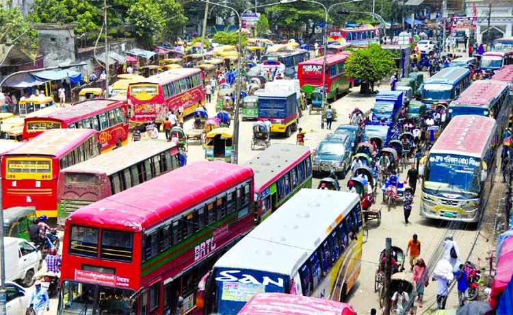 The capital city of Dhaka has got back its old look with return of its crowded footpaths and jam-packed main thoroughfares soon after Covid restriction was withdrawn. This photo was taken from Gulistan area on Sunday.