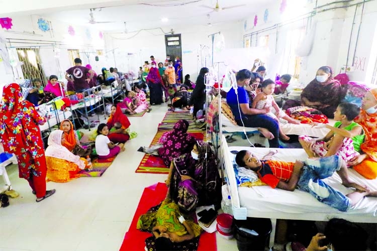 Patients get admitted to the Mitford Hospital for treatment on Monday as the mosquito- borne disease Dengue surged recently across the country.