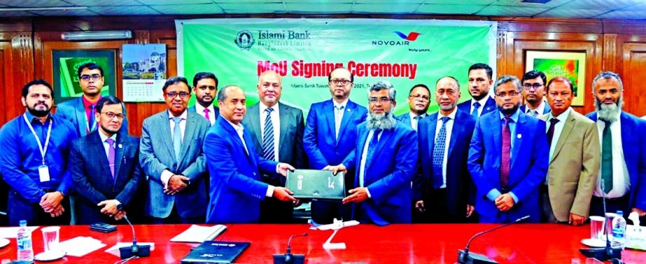 Islami Bank Bangladesh Limited (IBBL) and NOVOAIR Limited signed a Memorandum of Understanding regarding corporate facilities on Tuesday at the bank's head office. JQM Habubullah, DMD of IBBL and Mes-bah-ul-Islam, Head of Marketing & Sales of NOVOAIR, ex