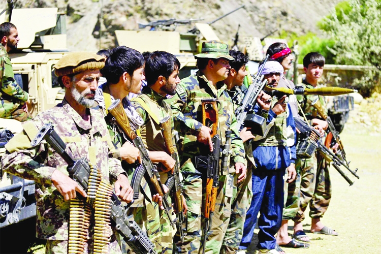 : Militiamen loyal to Ahmad Massoud, son of the late Ahmad Shah Massoud, hold their weapons, in Panjshir province northeastern Afghanistan, Thursday, Aug. 26, 2021. The Panjshir Valley is the last region not under Taliban control following their stunning