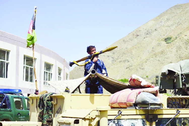 A Militiaman stands guard in Panjshir province northeastern of Afghanistan, Thursday, Aug. 26, 2021.