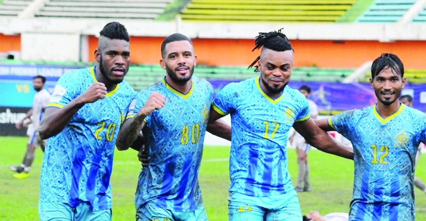 Players of Dhaka Abahani Limited celebrating after defeating Uttar Baridhara Club by eight goals to nil in their second leg match of the Bangladesh Premier League Football at the Bangabandhu National Stadium on Thursday.