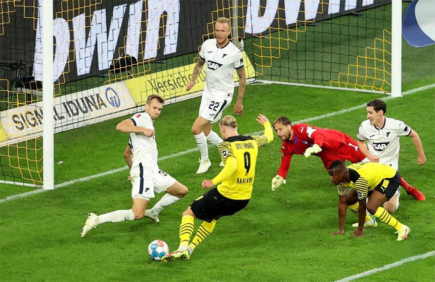 Erling Haaland (4th right) of Dortmund shoots during the German first division Bundesliga football match between Borussia Dortmund and TSG Hoffenheim in Dortmund, Germany on Friday.