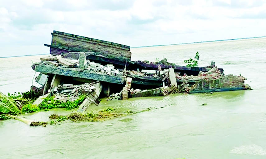 Several establishments including a health complex at Azimnagar Union devoured by the mighty River Padma. This photo was taken from Harirampur Char area in Manikganj on Sunday.