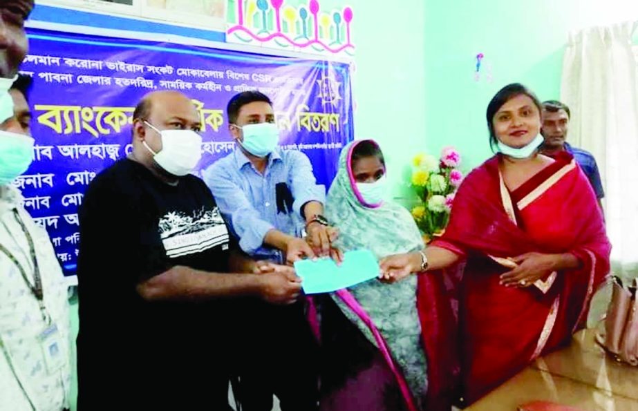 Financial grant was distributed among the poor people on Tuesday at the initiative of Bhangura Bazar branch of Pabna of Sonali Bank Limited. UNO Syed Asrafujjaman, Mayor Golam Hasnain Rashel, Vice Chairman Golam Hafiz Ranju, Women Vice Chairman Azida Parv