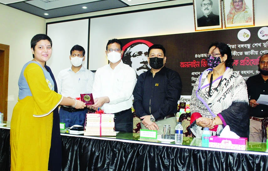 Sylhet Divisional Commissioner Md. Khalilur Rahman distributes prizes among the winners of an online based cultural contest organized on the occasion of the 46th Martyrdom Anniversary of the Father of the Nation Bangabandhu Sheikh Mujibur Rahman in a cere
