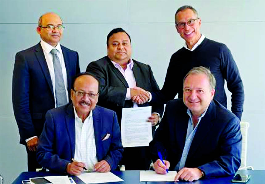 Ehsan Khasru, Managing Director of Padma Bank, and Neil Morganbesser, President and Chief Executive Officer of Del Morgan, signing MoU in California on Friday.