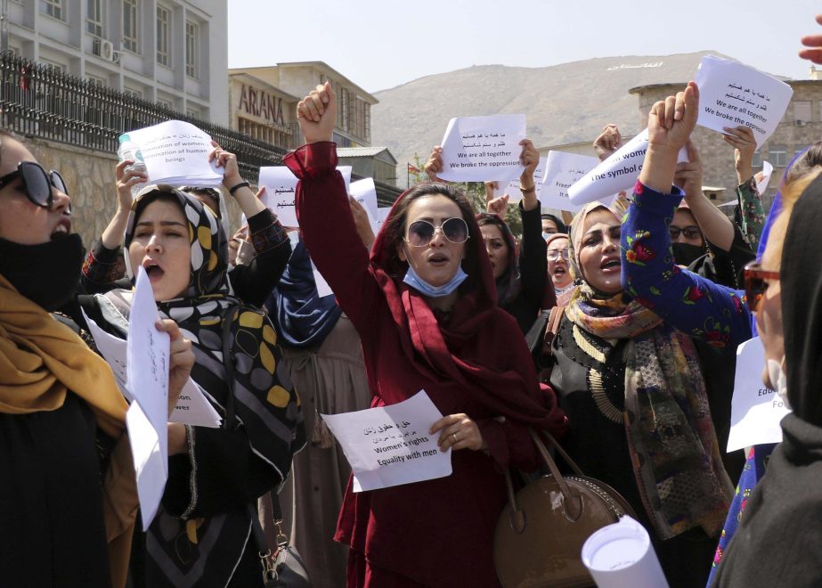Women gather to demand their rights under the Taliban rule during a protest in Kabul, Afghanistan, Friday, Sept. 3, 2021. As the world watches intently for clues on how the Taliban will govern, their treatment of the media will be a key indicator, along w