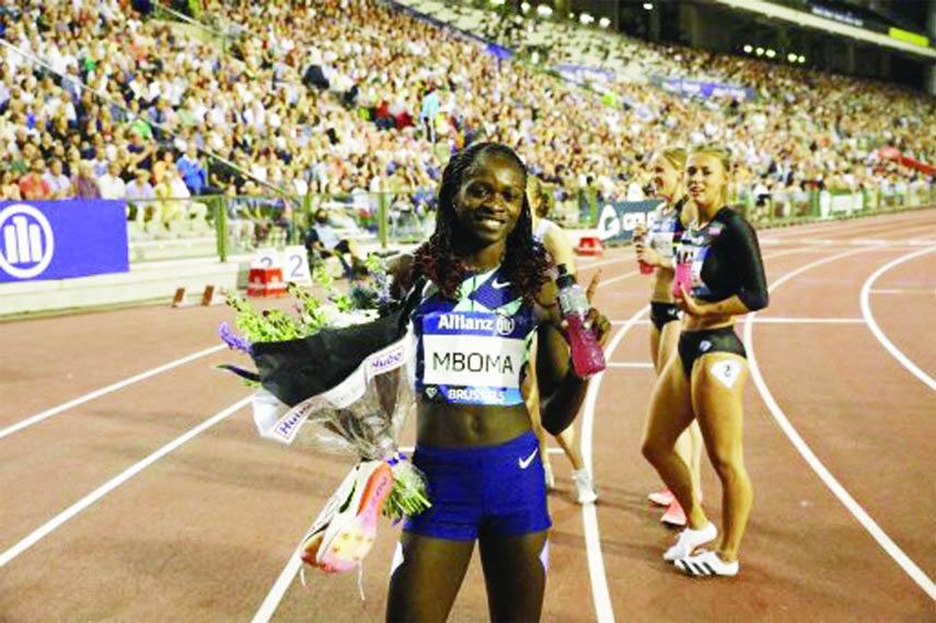Christine Mboma from Namibia celebrates after winning the 200m women final at the Diamond League track and field meeting in Brussels on Friday.