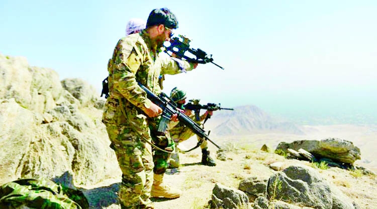 National Resistance Front forces are seen on a mountain top near the Panjshir Valley, Afghanistan.