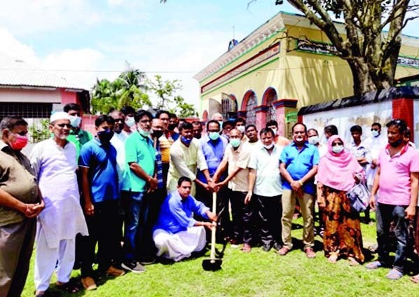 Ishwardi Municipality Mayor Ishaq Ali Malitha inaugurates construction work of a road to Maubari Temple in Ishwardi on Monday.