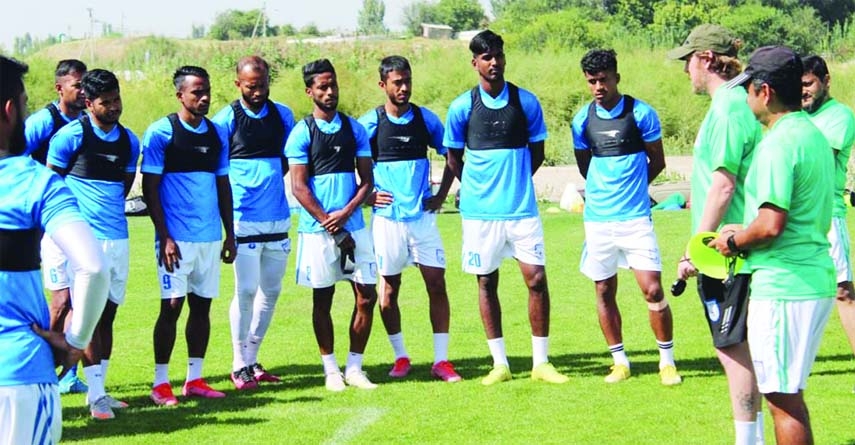 Head Coach of Bangladesh Football team Jamie Day (second from right) giving tips to the members of Bangladesh Football team at Bishkek, the capital city of Kyrgyzstan on Monday.