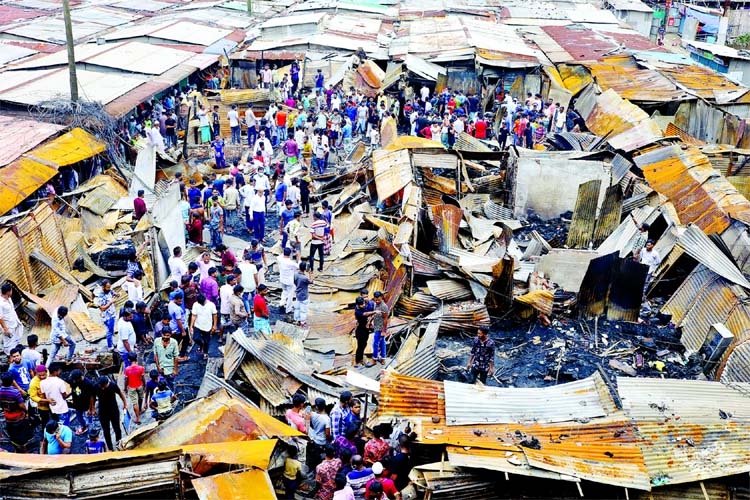 At least 250 shops were gutted in a devastating fire at Keraniganj wholesale market on Monday.