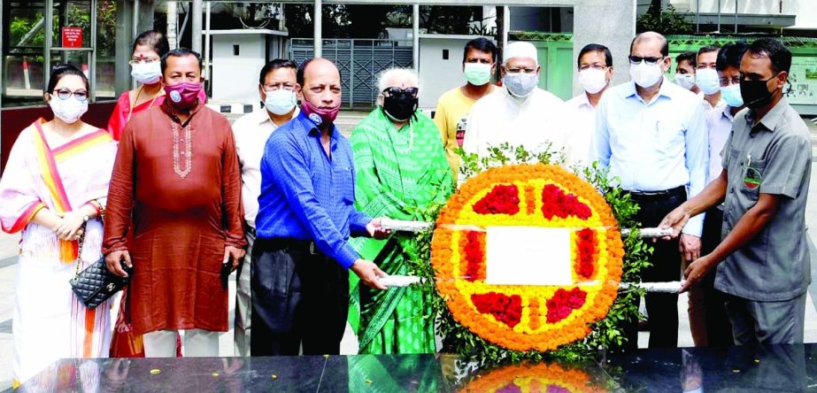 State Minister for Religion Faridul Haque Khan along with the members of the newly formed Buddhist Religious Welfare Trust pays floral tributes at the portrait of Father of the Nation Bangabandhu Sheikh Mujibur Rahman in the city's 32, Dhanmondi on Tuesd