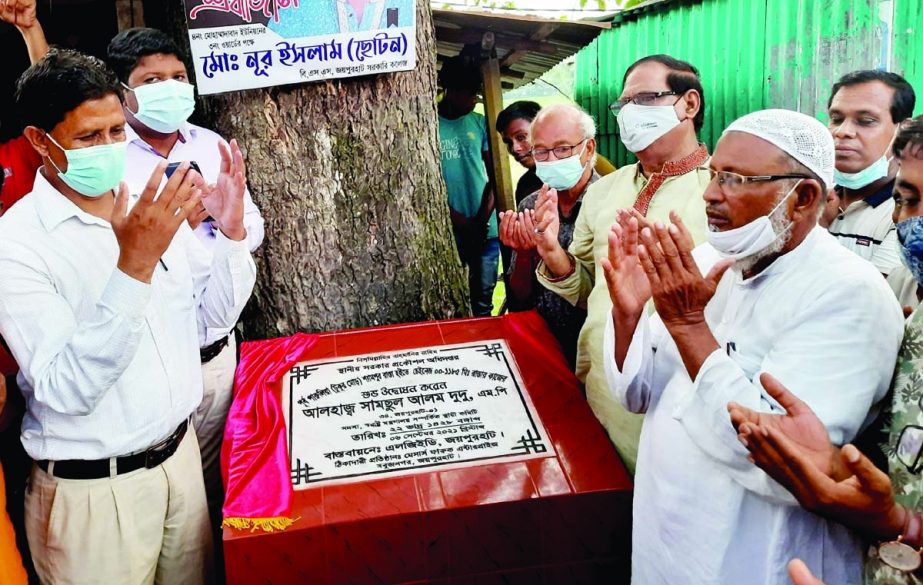 Shamsul Alam Dudu, MP from Jaypurhat -1 constituency inaugurates the construction work of one and half-a-kilometer road from East Parulia Tukur Mor to Shampur in a formal ceremomy held at East Parulia on Monday. NN photo