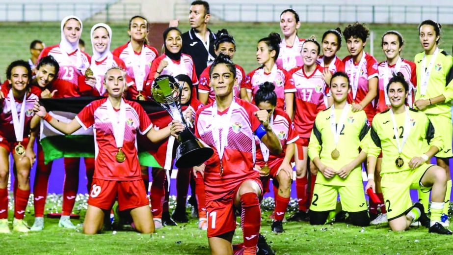 Members of Jordan Women's Football team celebrating after winning the Arab Women's Cup in Egypt on Monday. Agency photo