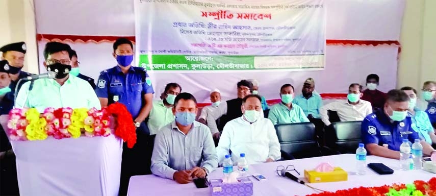 Moulvibazar Deputy Commissioner Mir Nahid Ahsan speaks at an arbitration meeting to end the hostility between the Bengali people and the Khasia tribal held at Muruichari Forestbeat area of Kulaura upazila on Tuesday.