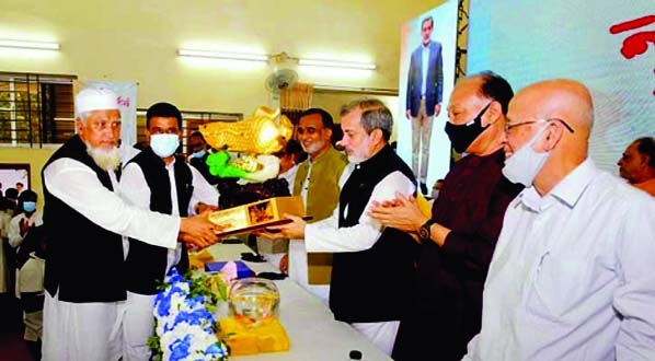 ABM Fazle Karim Chowdhury, MP, Chairman, Parliamentary standing committee on Railway, receives crest at a ceremony organized to give him a grand reception by Chattogram North District Awami League at Raozan Fazlul Kabir Auditorium on Wednesday.