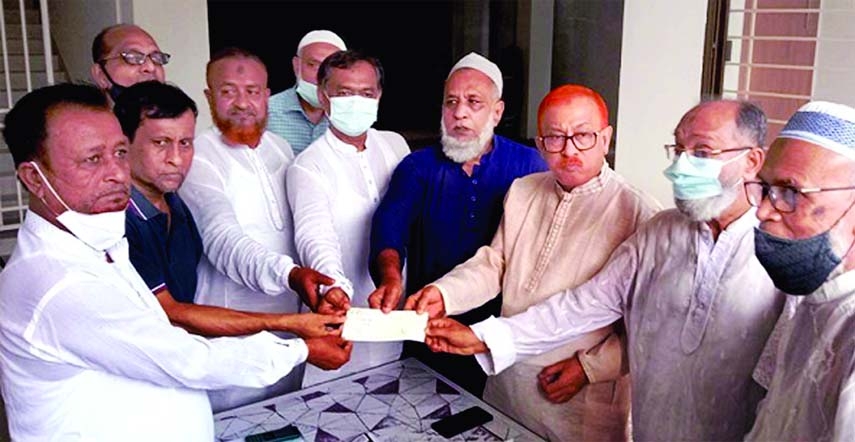 Chandpur District Awami League Secretary Abu Nayeem Patwary Dulal in a simple ceremony on Wednesday hands over a cheque for Tk Five lakh to the party's former district Labour Affairs Secretary Rafiqul Islam Bhuiyan who, among many, got grievous injuries