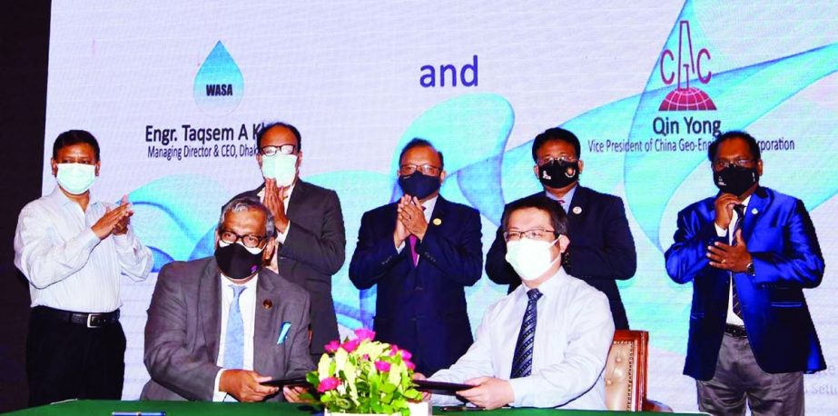 LGRD and Cooperatives Minister Tajul Islam, among others, at a deal signing on 'Package 3.1: Distribution Reinforcement Pipeline' for Gandhabpur Water Treatment Plant under DESWS Project, Dhaka WASA at Hotel Sonargaon in the city on Thursday. NN photo