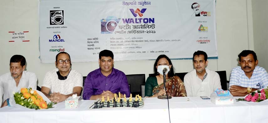 President of National Press Club Farida Yasmin (third from right) speaking at the inaugural ceremony of the Walton Photo Journalists Sports Festival in the Auditorium of Bangladesh Photo Journalists' Association on Friday.