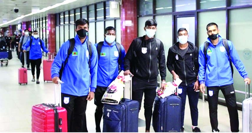 Members of Bangladesh Football team arrive at the Hazrat Shahjalal International Airport on Friday night.