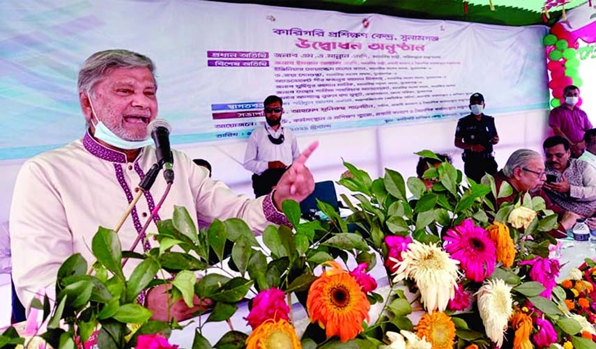 Planning Minister MA Mannan speaks at a program in Sunamganj on Sunday presided over by Additional Secretary Ahmed Munirus Saleheen, Expatriates' Welfare and Overseas Employment Ministry. Imran Ahmed, state minister for Expatriate Welfare and Overseas Em