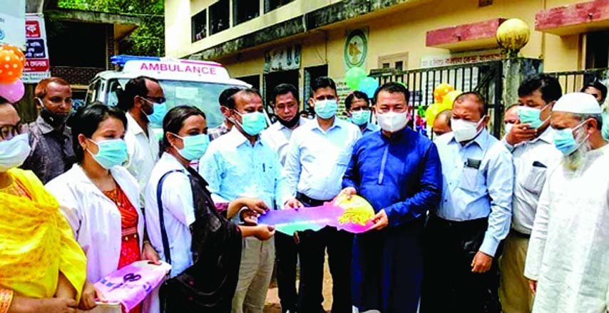 Chairman of Khahrachhari Hill District Council Monsuipru Chowdhury Apu officially handed over the keys of an ambulance to Emran Hossain Chowdhury, Deputy Director of the district family Planning Department provided by the Prime Minister Sheikh Hasina to K