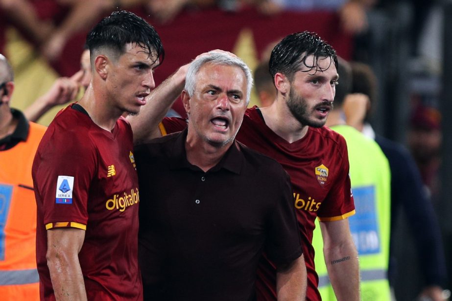 Jose Mourinho of Roma (center) celebrates Stephan El Shaarawy's 2-1 goal with Roger Ibanez (left) and Matias Vina (right) during the Italian championship Serie A football match against Unione Sportiva Sassuolo Calcio at Stadio Olimpico in Rome, Italy on