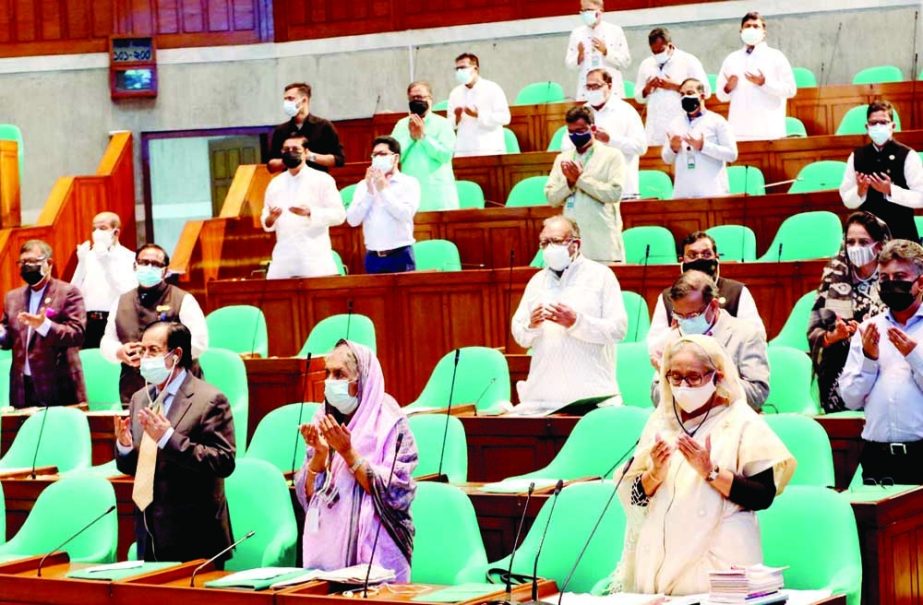 Prime Minister Sheikh Hasina offers munajat for the salvation of departed soul of Jatiya Party MP from the reserved seat for women Masuda M Rashid Chowdhury at the 14th session of the 11th parliament on Tuesday. PID photo