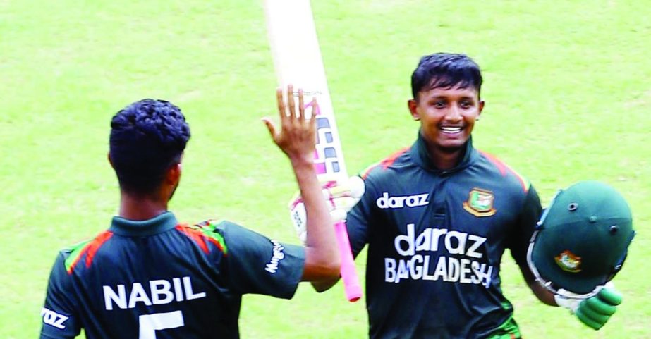 Aich Mollah (right) of Bangladesh Under-19 Cricket team celebrating his century against Afghanistan Under-19 Cricket team in the third one-day at Sylhet International Cricket Stadium on Tuesday. Agency photo