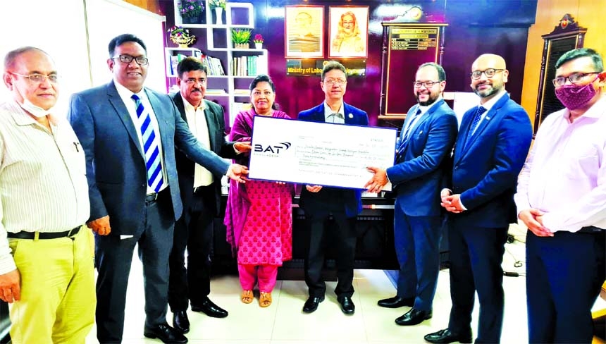 Representatives of the British American Tobacco (BAT) handing over cheque to Md Ehsane Elahi, Secretary of the Labour and Employment Ministry, for Bangladesh Workers' Welfare Foundation Fund at the latter's office in Bangladesh Secretariat on Thursday.