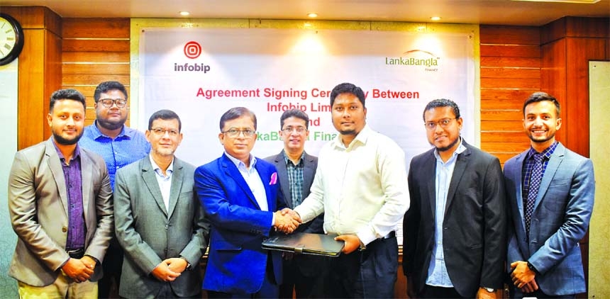 Lanka Bangla Caption: Khurshed Alam, Senior Executive Vice President and Head of Retail Business of LankaBangla Finance Limited and Rahad Hossain, Country Manager of Infobip, Bangladesh, exchanging documents after signing an agreement in a city hotel on T