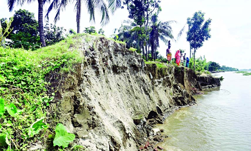 Hundreds of residents of Khasakandi village under Keraniganj upazila passing their days in fear and anxiety due to the erosion of Dhaleshwari River, which has already swalloed large part of the village.