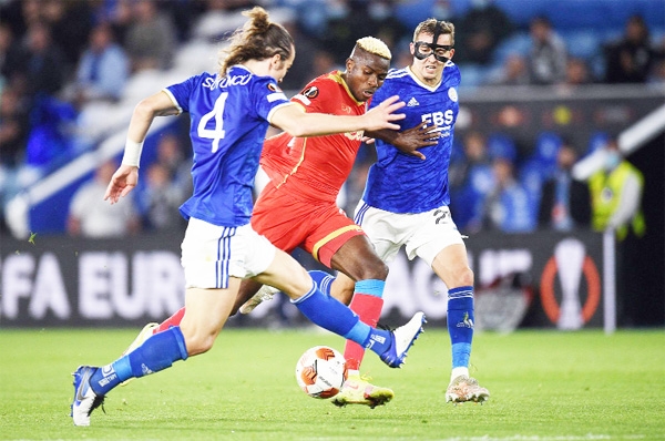 Napoli forward Victor Osimhen (centre) vies with Leicester City's Çaglar Söyüncü (left) and Timothy Castagne during a Europa League match at the King Power Stadium in Leicester, England on Thursday.