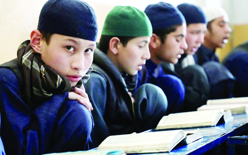 Afghan boys read the Koran in a madrasa, or religious school in Kabul, Afghanistan.