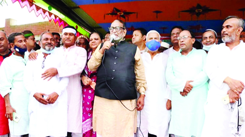 Nuruzzaman Biswas, MP from Pabna-4 constituency speaks at a mass reception program organized to honour him at Muladuli of Ishwardi on Friday.