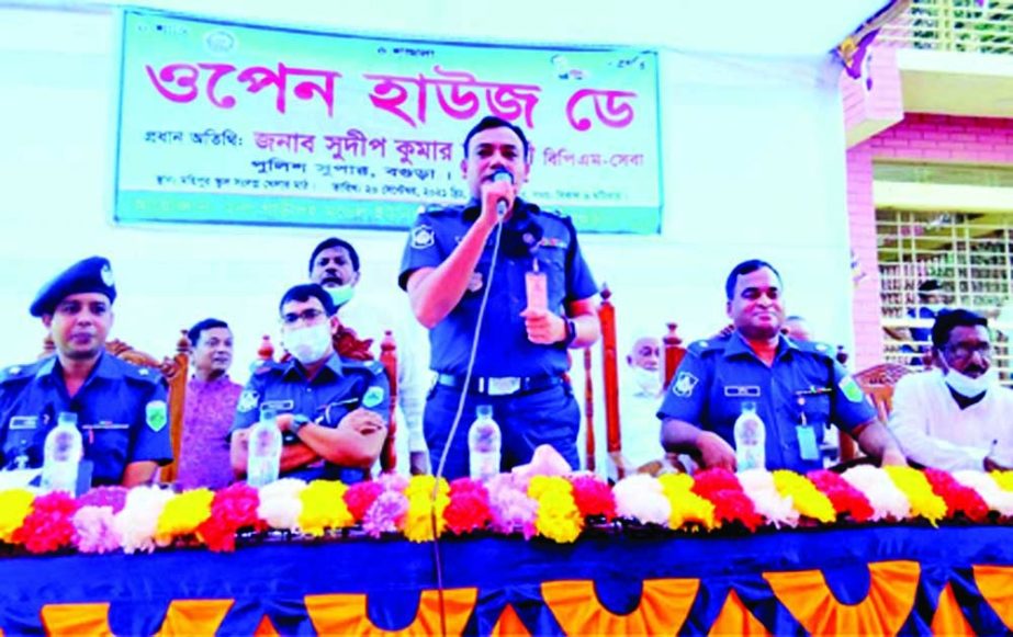 Bagura Police Super Sudip Kumar Chakrabarti, BPM (Service) speaks at an Open House Day program held in Mohipur School field organized by Sherpur Thana on Monday. NN photo