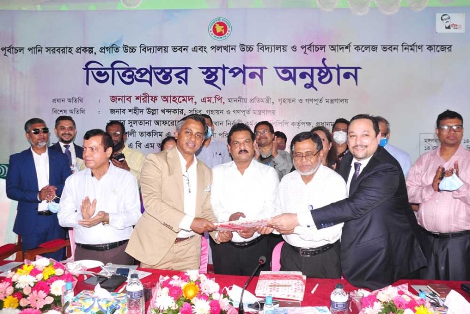 Rajuk Chairman ABM Amin Ullah Nuri, City Bank's AMD Sheikh Mohammad Maroof and Managing Director of United Delcot Dayem Khandker, exchanging document after signing an agreement on behalf of respective organization at Rajuk Site Office at Purbachal on Tue