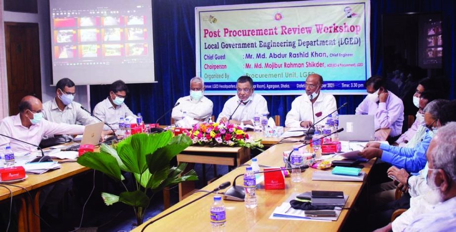 Participants at a workshop on 'Post Procurement Review' organised by LGED at its headquarters in the city on Tuesday. Engineer Abdur Rashid Khan presides over the event.