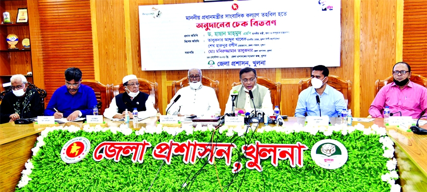 Information and Broadcasting Minister Dr. Hasan Mahmud speaks at the distribution of cheques among the journalists from Journalists Welfare Trust at Khulna DC office on Friday.