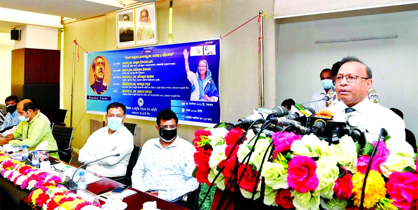 LGRD and Cooperatives Minister Tajul Islam speaks at a seminar on 'Water Stagnant in Dhaka City: Problems and Solution' at IEB Council Hall in the city on Friday.